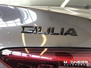 Alfa Romeo Giulia Emblem - Nero Edizione - Rear Alfa Romeo Giulia Emblem - Nero Edizione - Rear
